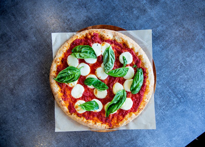Margherita pizza with fresh tomato and mozzarella