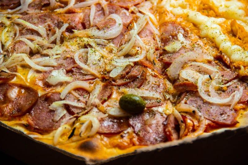 BBQ Smokehouse pizza with pulled chicken and caramelized onions